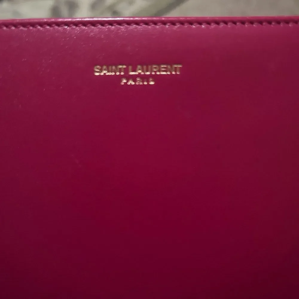 Authentic Saint Laurent Pink Zippy Wallet
